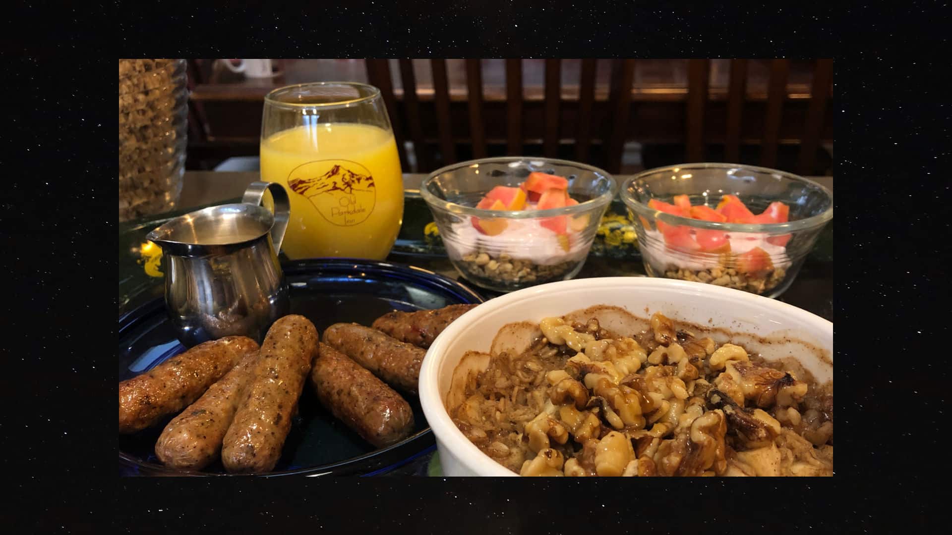 Baked Oatmeal with link sausage, fruit and orange juice