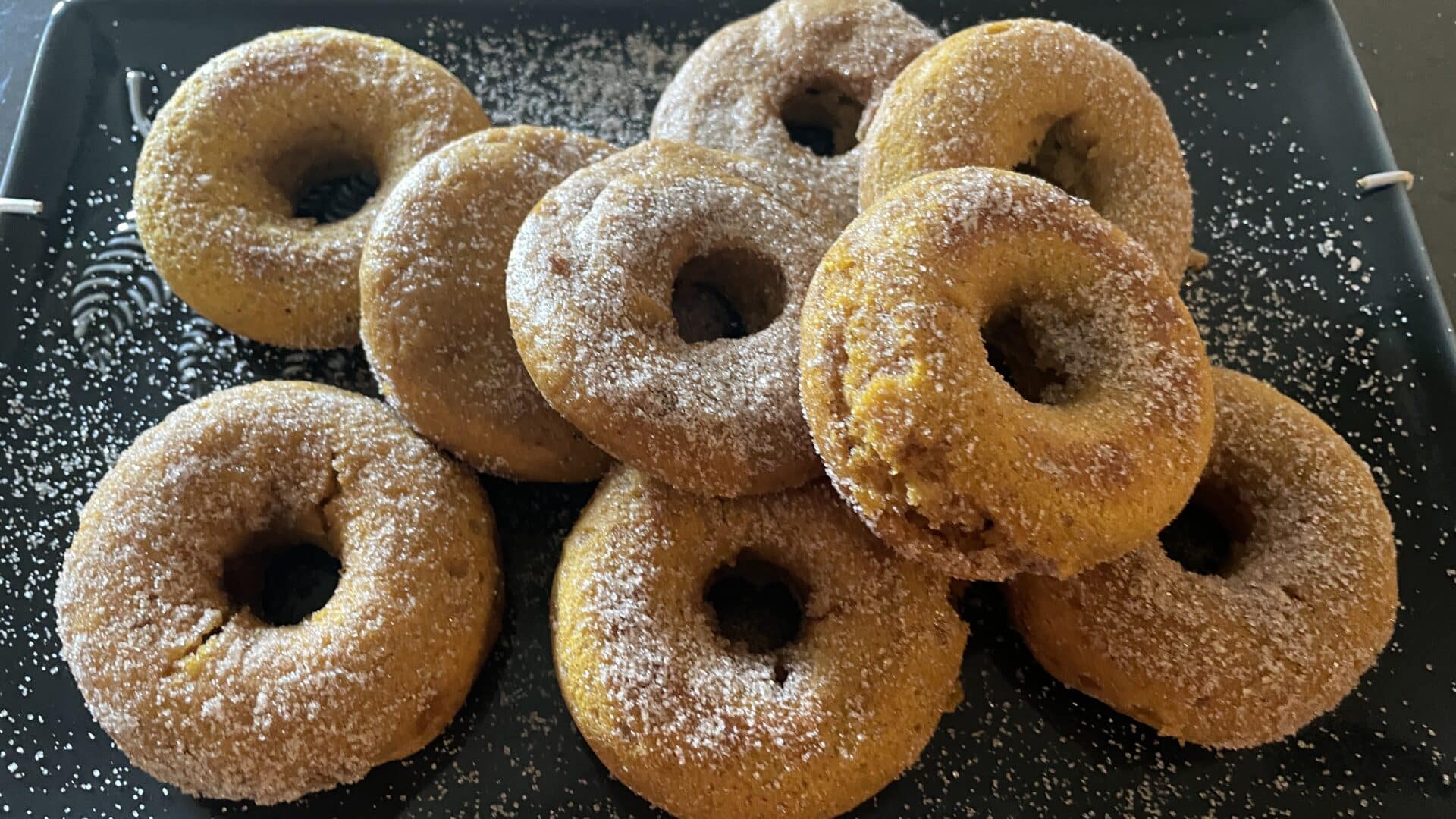 Pumpkin Spice donuts on a green plate