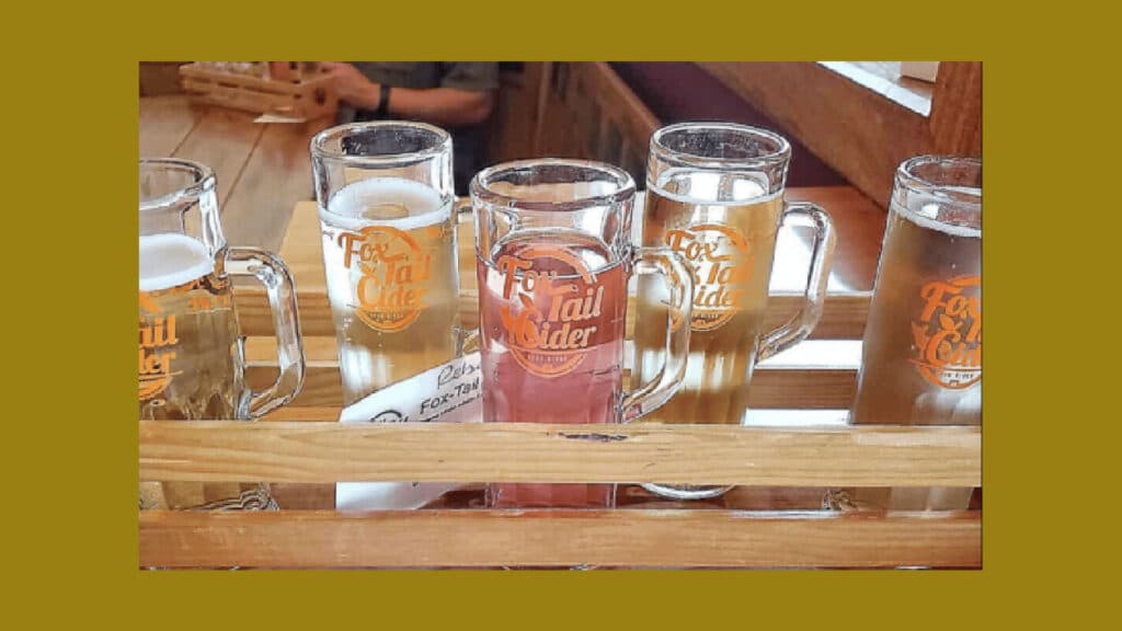 Flight of Fox Tail Cider in wooden server