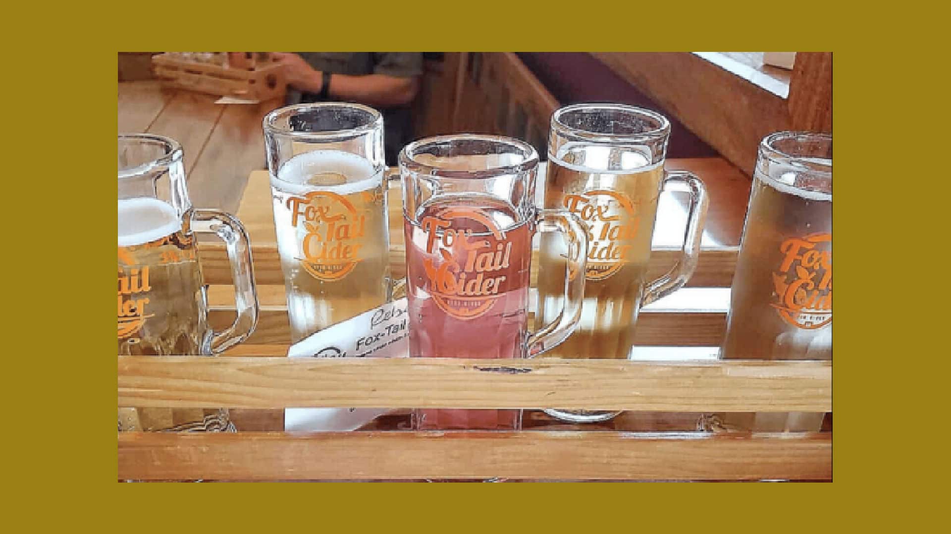 Flight of Fox Tail Cider in wooden server