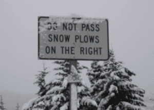 Don't Pass Snow Plows on the Right Highway Sign